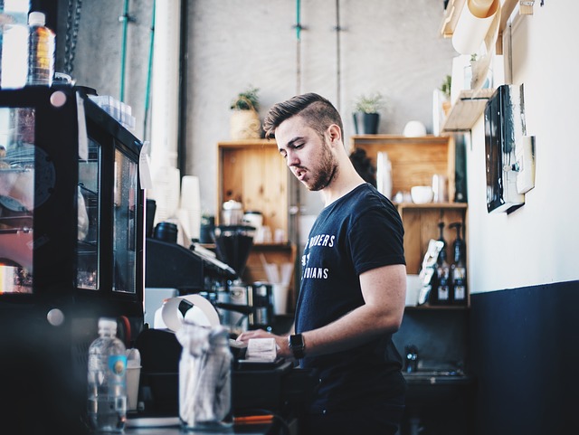 man at cash register