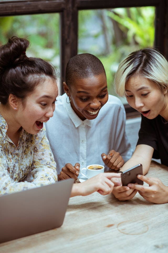 excited women entering a giveaway