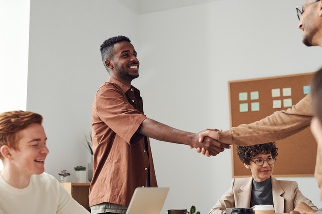 two people shaking hands