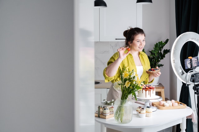 woman creating baking video