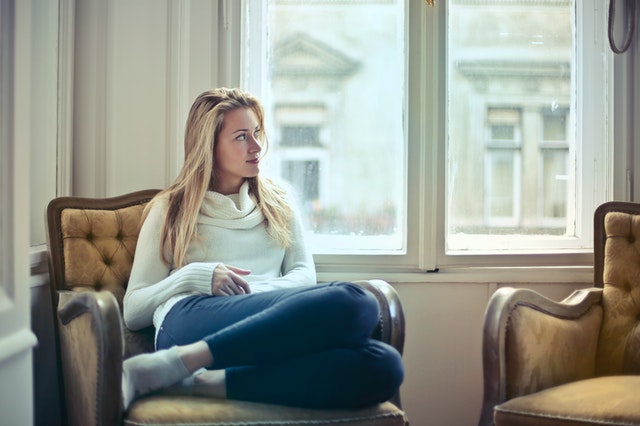 woman resting in chair