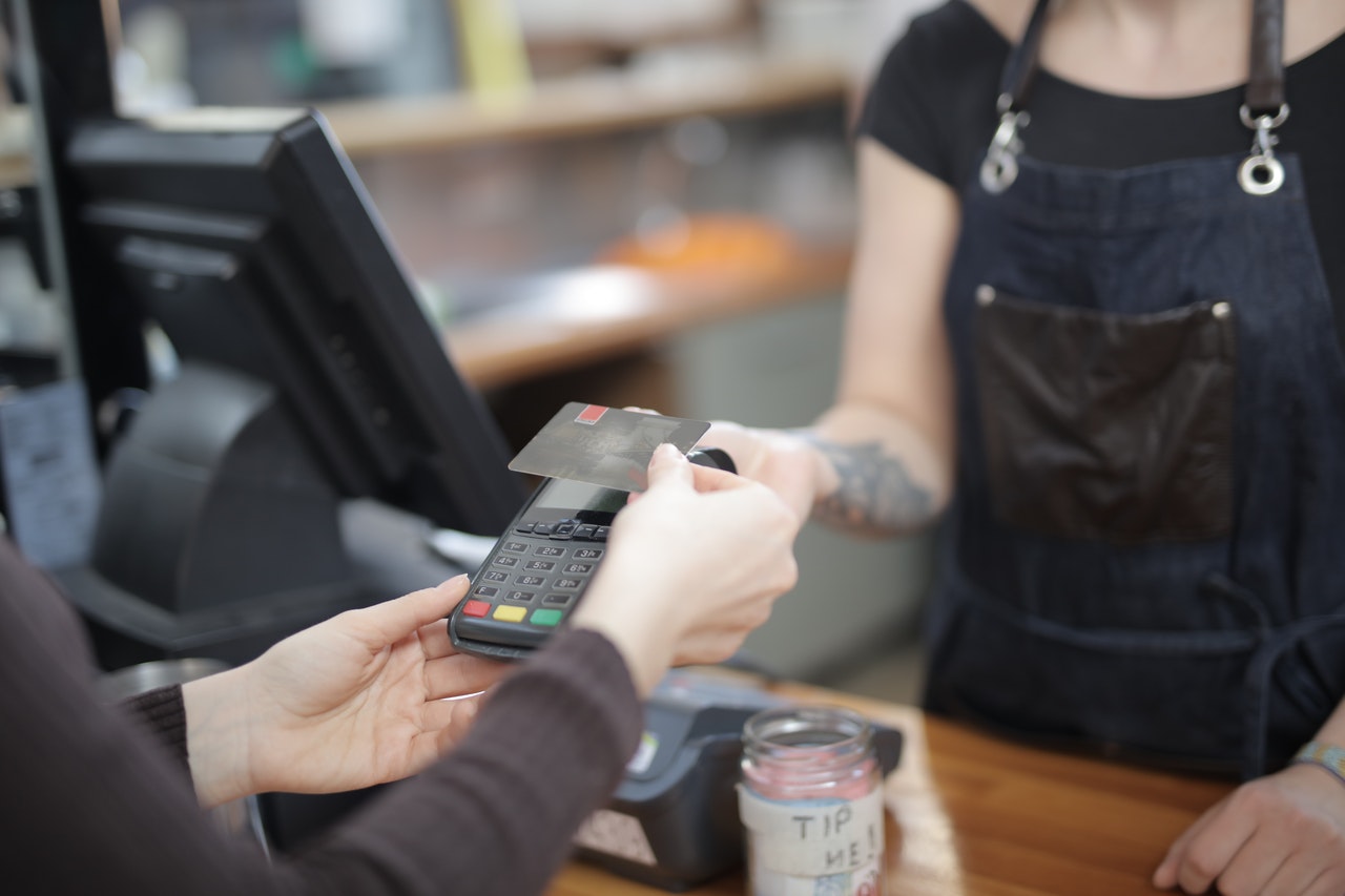 customer swiping card using payment processing