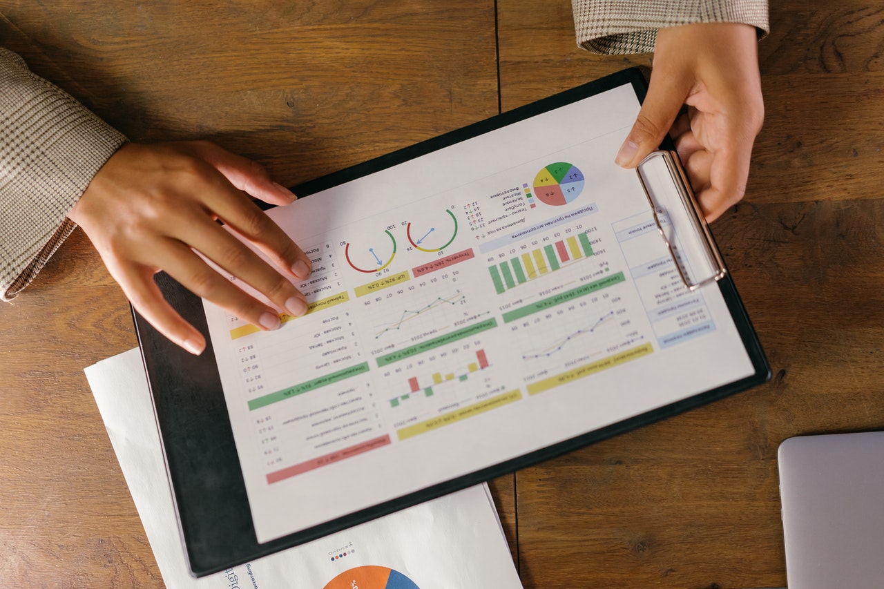 Several multicolored charts printed on paper