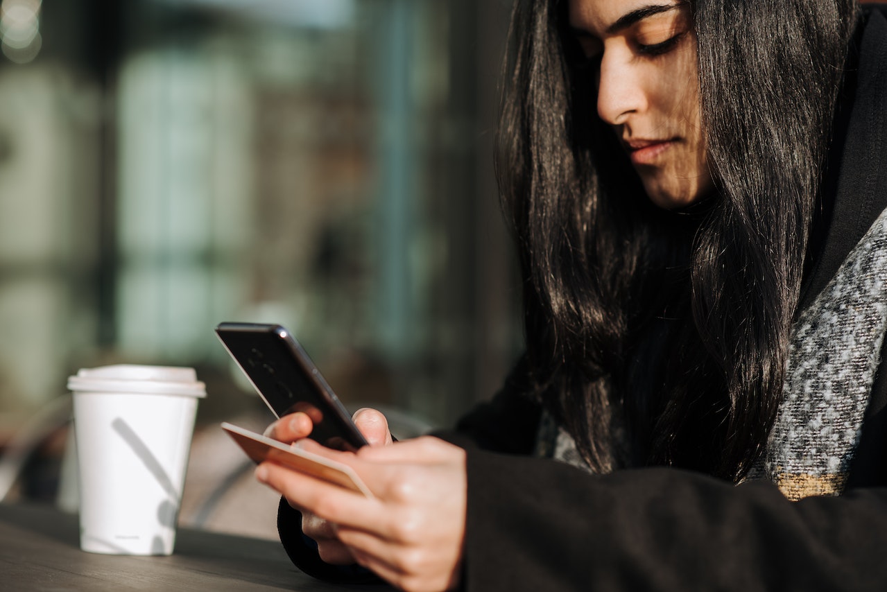 A shopper using a gift card to buy online