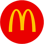 A yellow McDonalds logo on a red circle background
