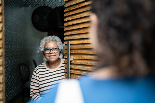 Elder woman solving dispute with her neighbor