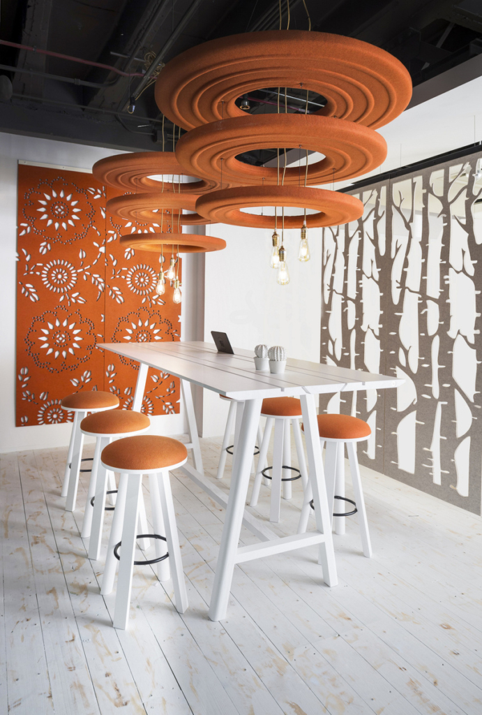 Noise dampening fabrics and panels are a great open office hack to reduce noise.