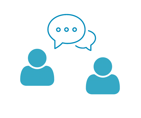 People conversing with each other in a meeting