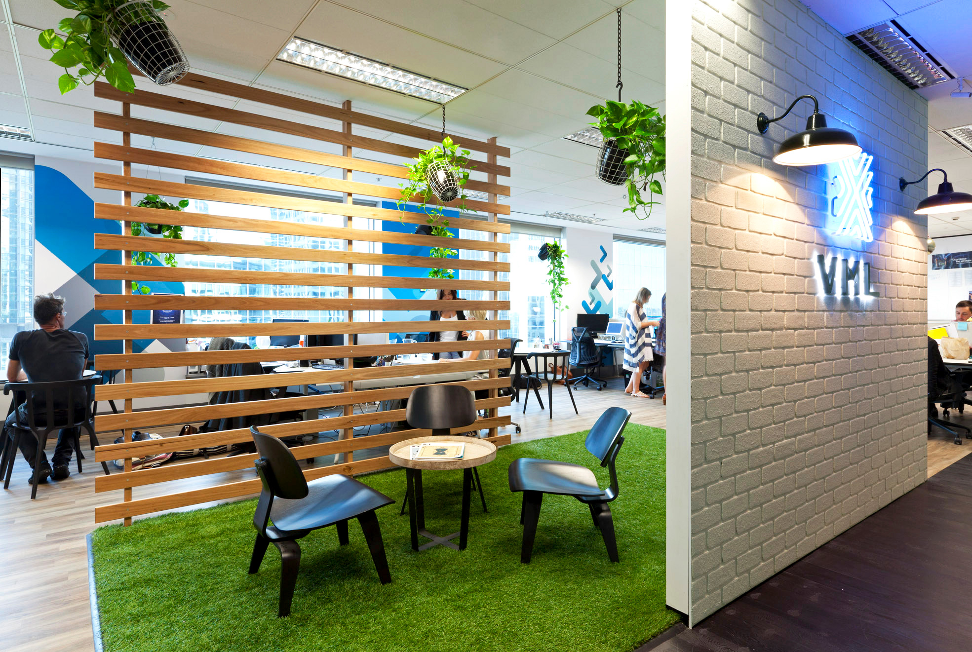 Meeting space with astroturf floors in the office