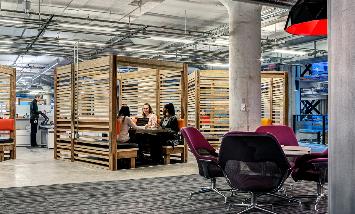 Group of wooden box breakout tables in Lowe Campbell's office