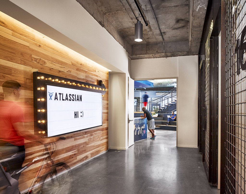 Incorporate customizable designs like Atlassian did in your workplace design strategy to give people a sense of ownership