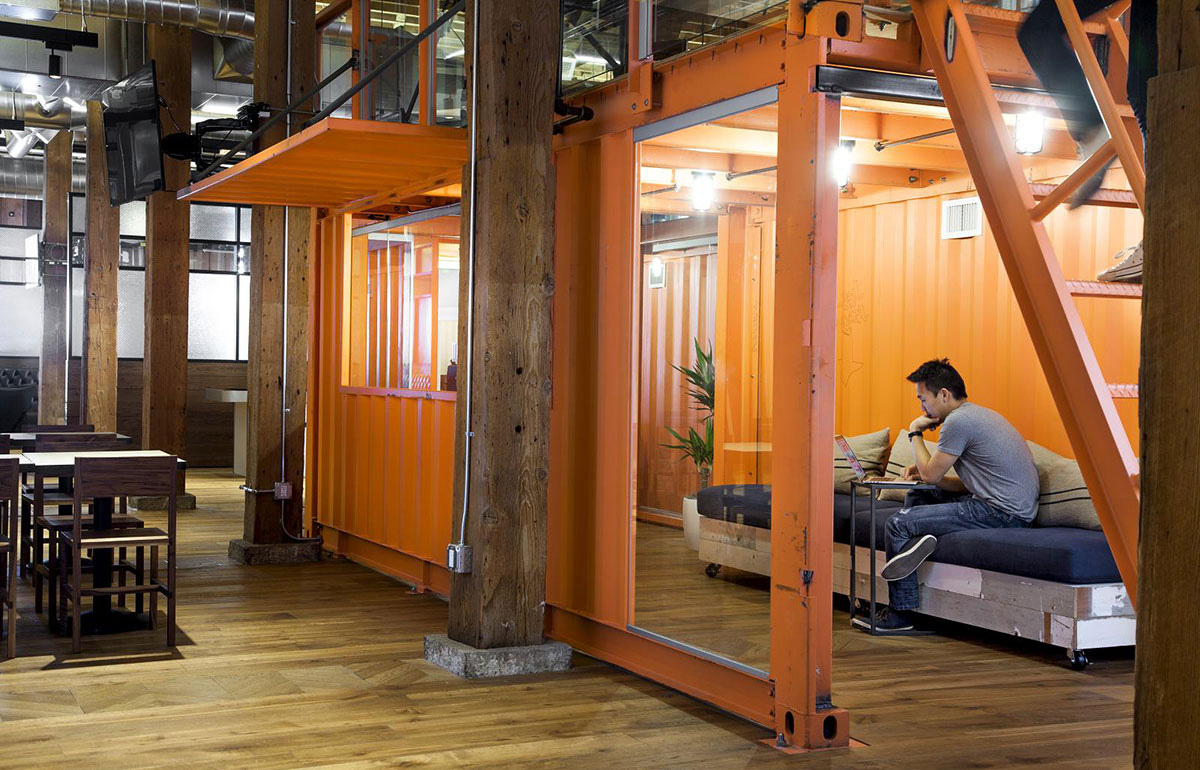 Orange metal container with bench at Github's office