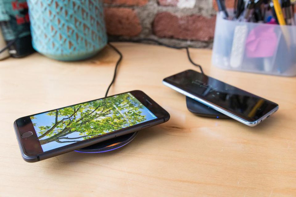 Wireless smartphone charging pads