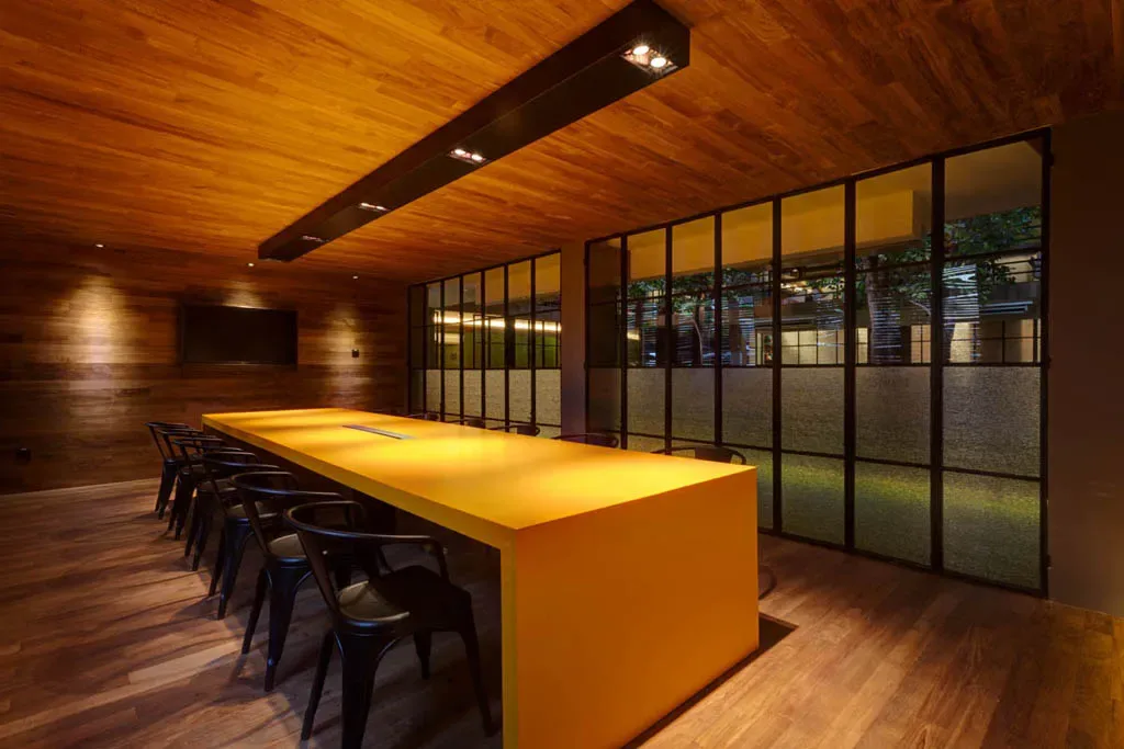 Kui Film yellow table with metal chairs