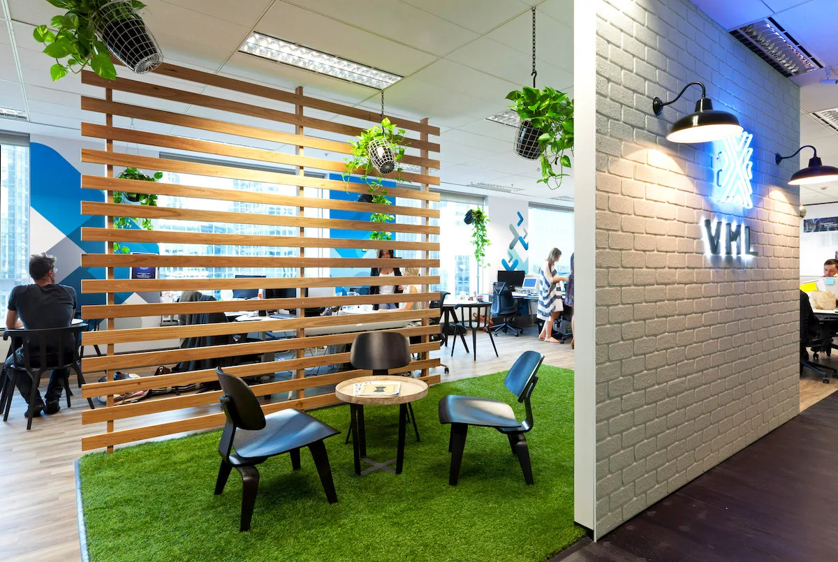 Meeting space with astroturf floors in the office