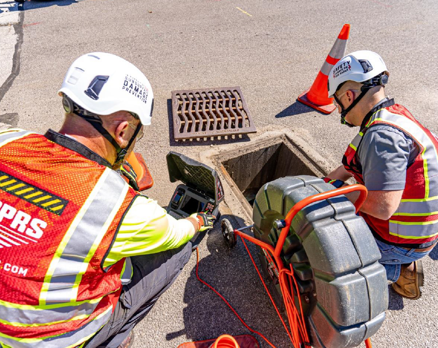 Two GPRS Project Managers performing Video Pipe Inspection