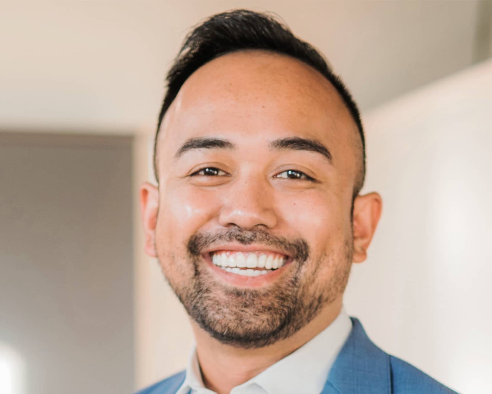 Photo of Justin Phalichanh, SVP, Global Talent Development & Product Enablement at Kinesso