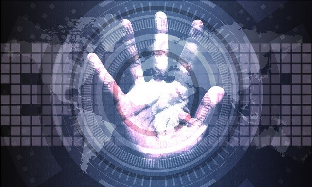 hand on camera eye for scanning