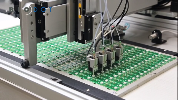 Conveyor Based Dispensing Systems for Diagnostic Test Manufacturing