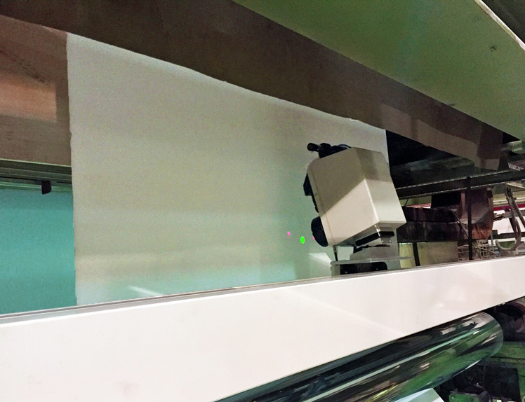 On-line NIR Sensor for Paper Moisture and Coating Thickness Measurement