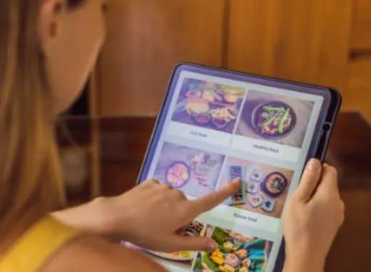 Digital workout machines - A woman working out on a strength training machine.