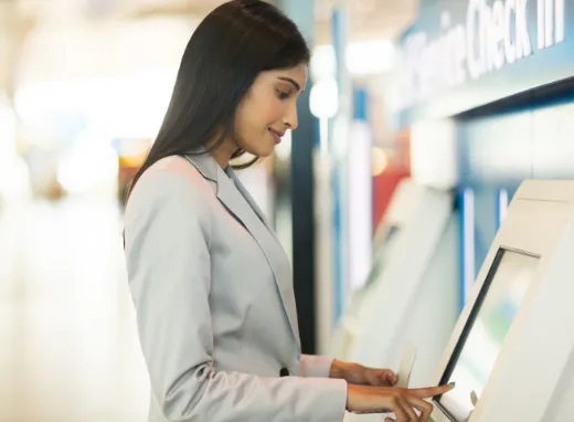 Digital workout machines - A woman working out on a strength training machine.