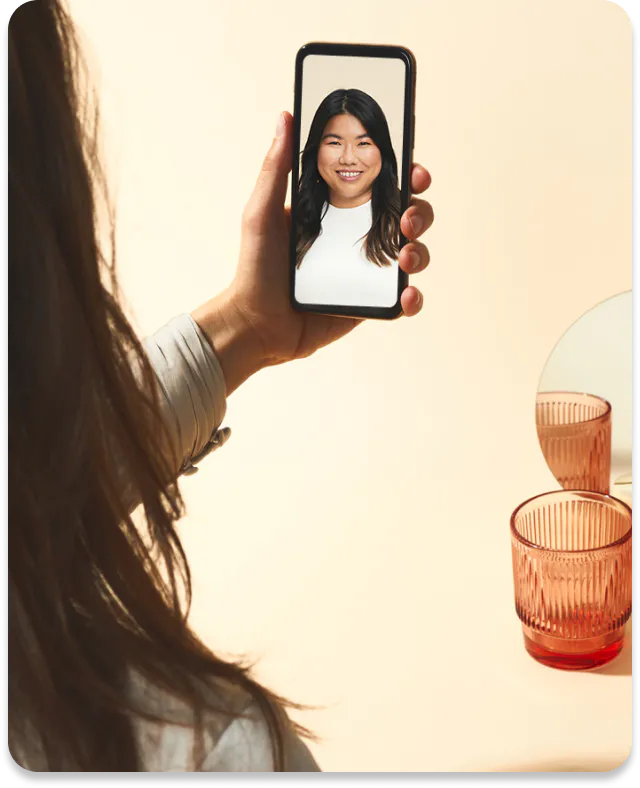 women holding mobile video calling