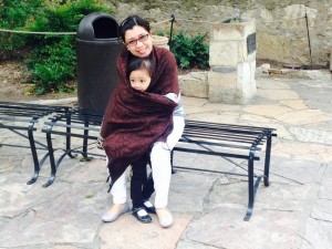 mother cuddling her son