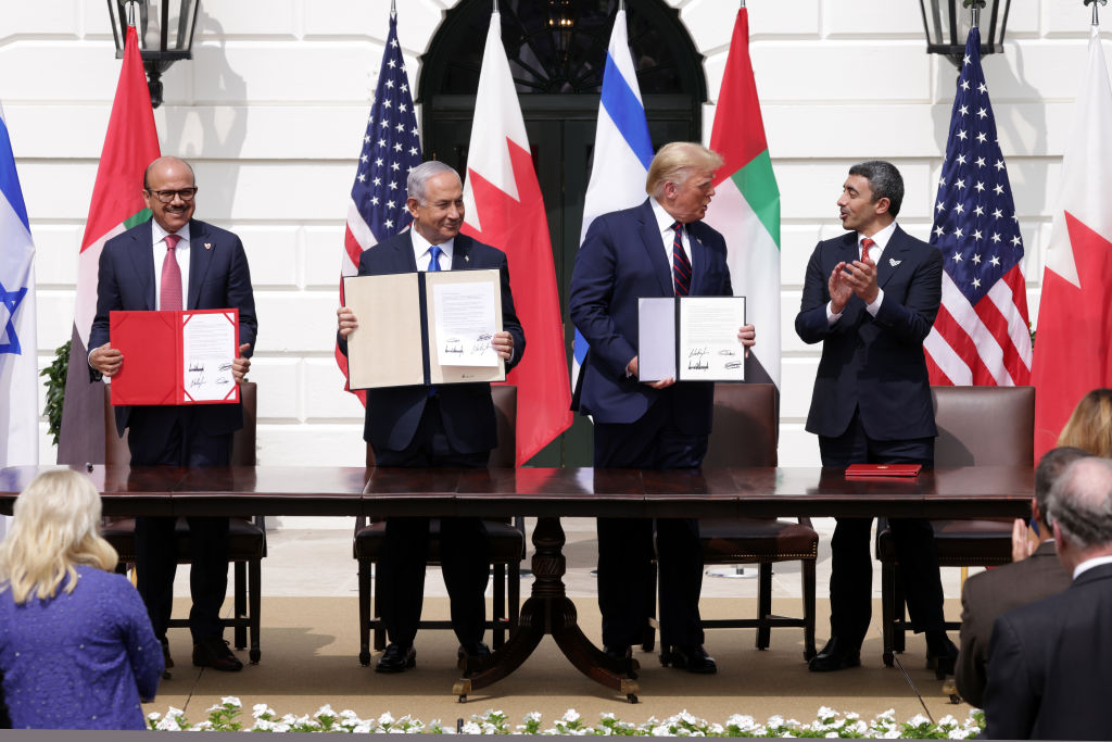 Foreign Affairs Minister of Bahrain Abdullatif bin Rashid Al Zayani, Prime Minister of Israel Benjamin Netanyahu, U.S. President Donald Trump, and Foreign Affairs Minister of the United Arab Emirates Abdullah bin Zayed bin Sultan Al Nahyan participate in the signing ceremony of the Abraham Accords on the South Lawn of the White House on September 15, 2020