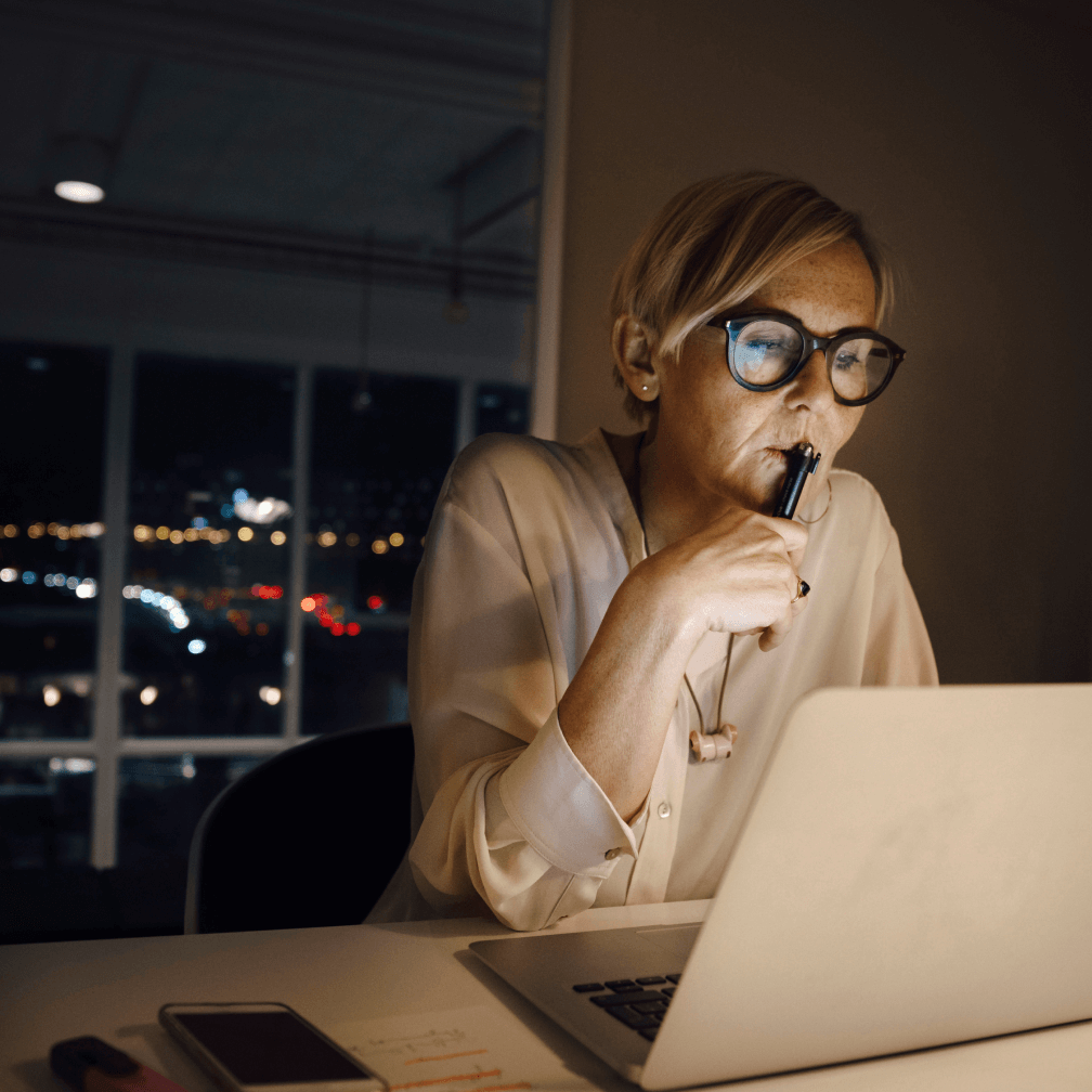 Woman looking at a laptop
