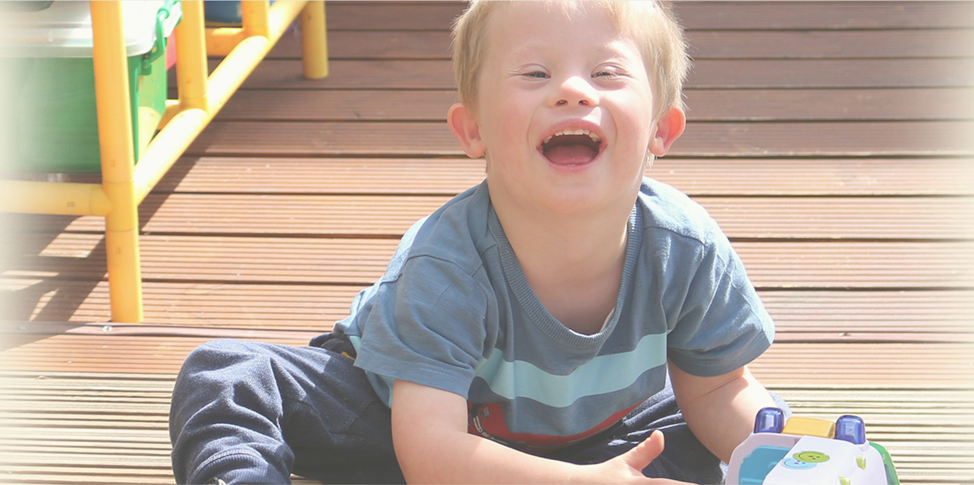 A young child playing with a toy