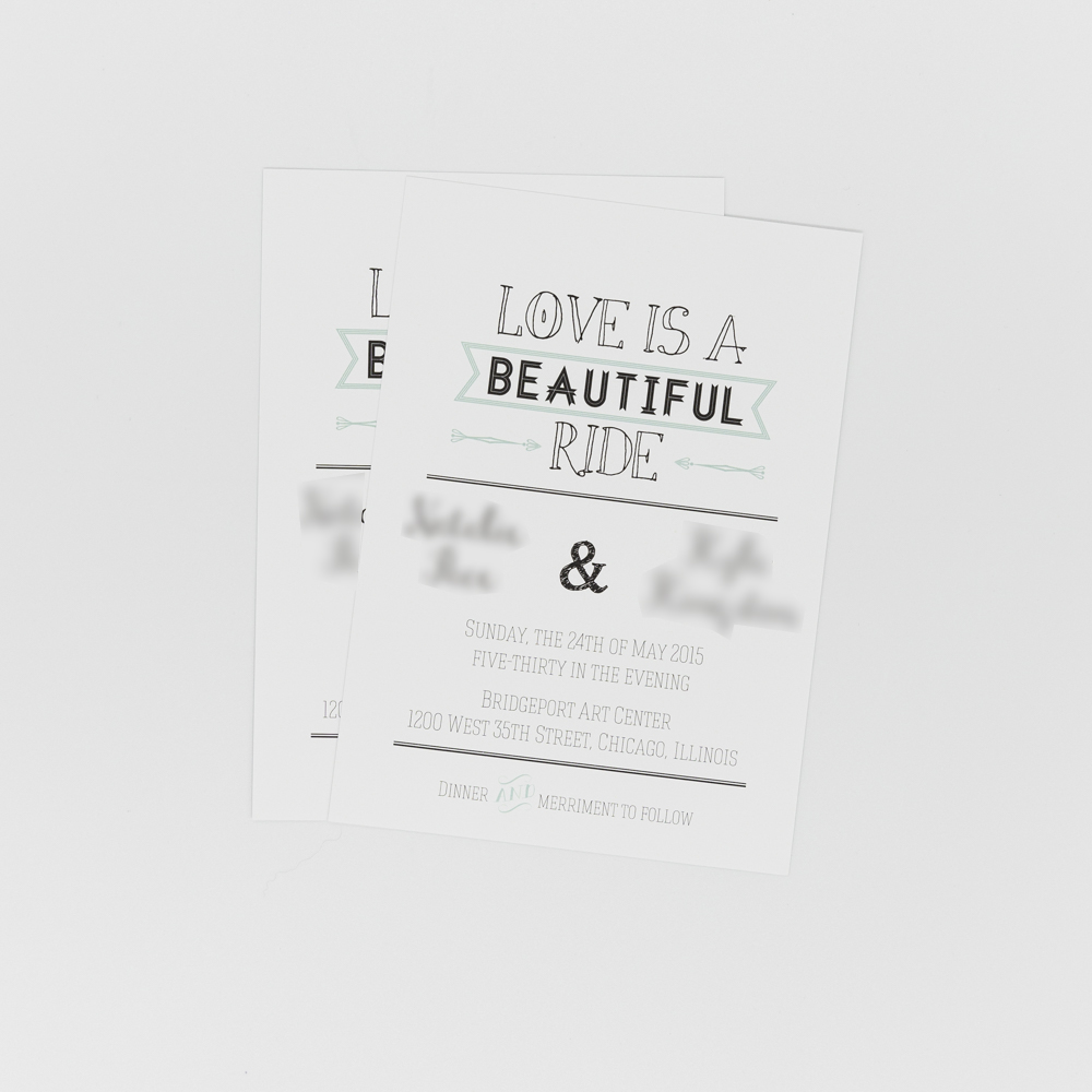 Wedding invitation featuring the text "Love is a Beautiful Ride"