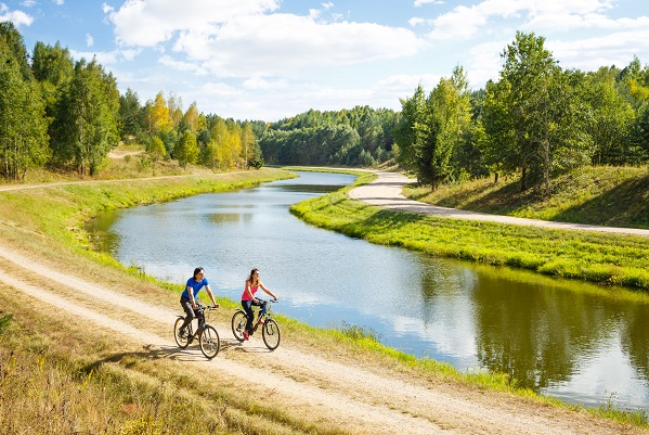 Cycling By The River