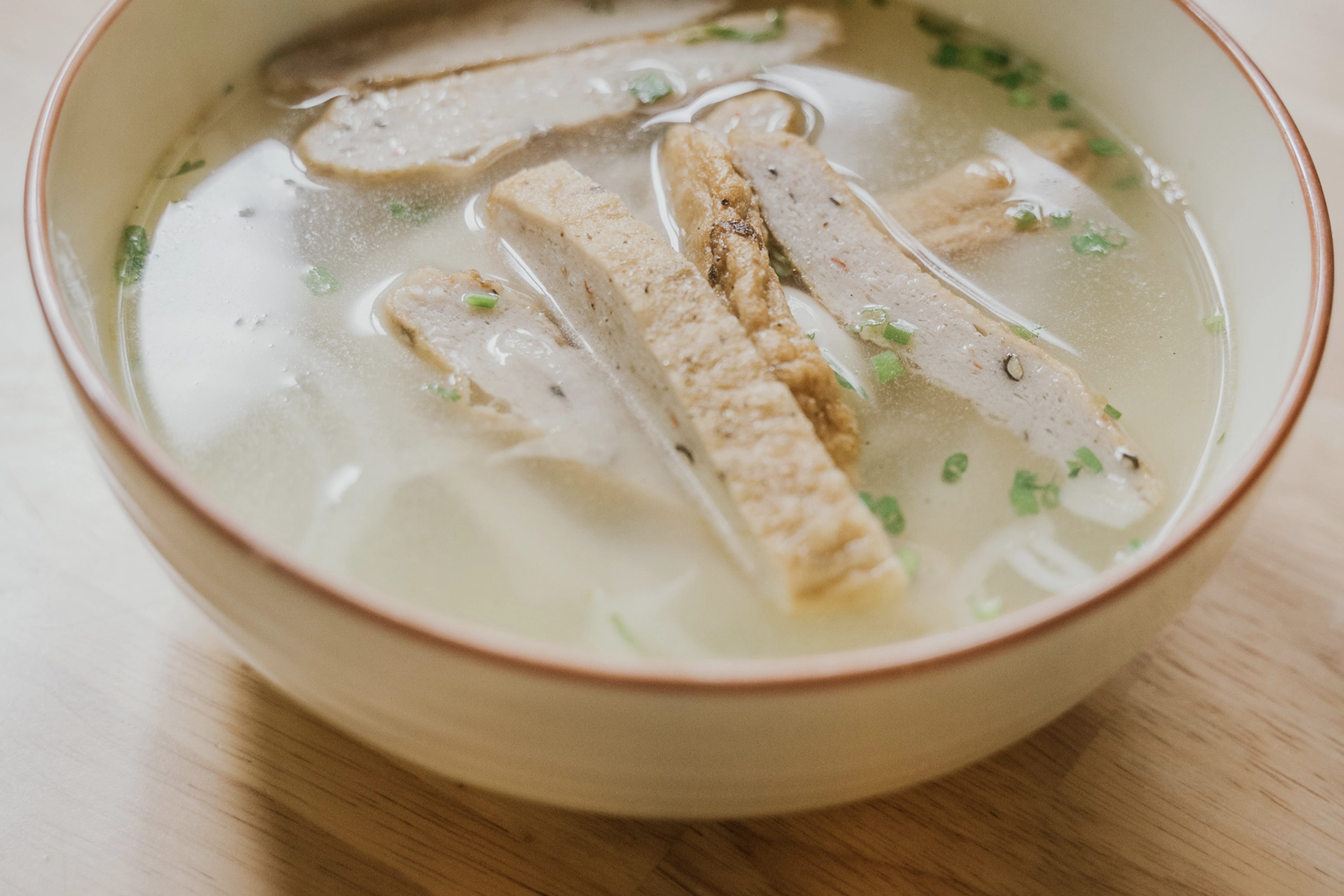 a bowl of chicken bone broth soup