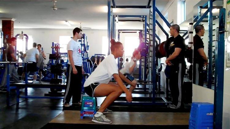Liz Cambage executing a perfect ROM squat. The ROM squat is great for court sports (basketball, netball, tennis, squash, badminton) for helping an athlete get stronger and more comfortable in a low athletic stance. NB - We don't load the ROM squat, instead we progres reps and range.