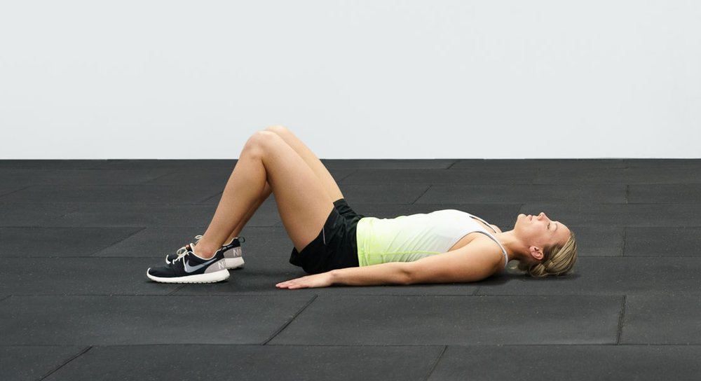 Bridge position. Putting your hands under your lower back to feel the contraction can be helpful.