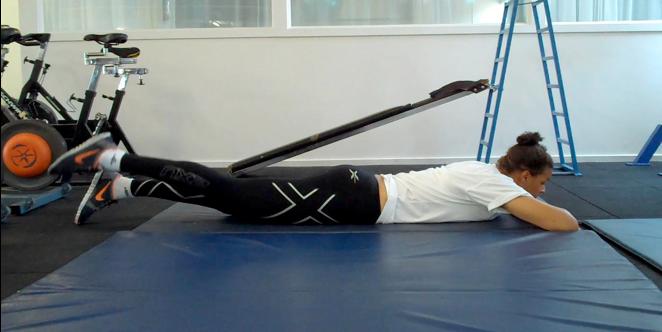 liz lyying glutes.png