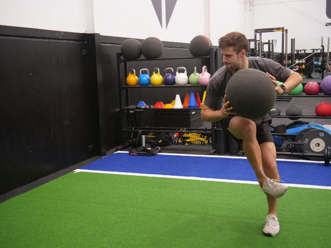 A wall ball push pass exercise