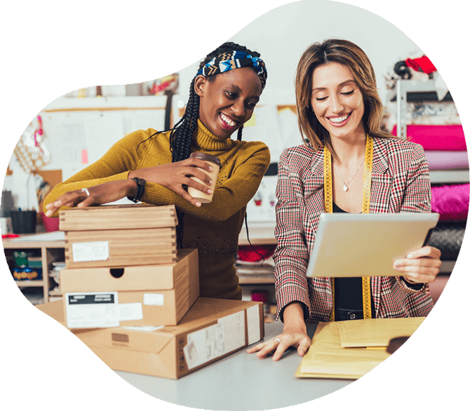 Image of 2 ladies looking at an iPad