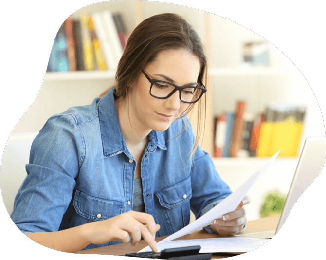 Image of a woman doing her taxes