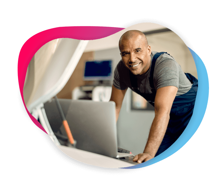 Image of a man using a laptop