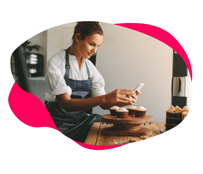 Image of a chef using a mobile phone