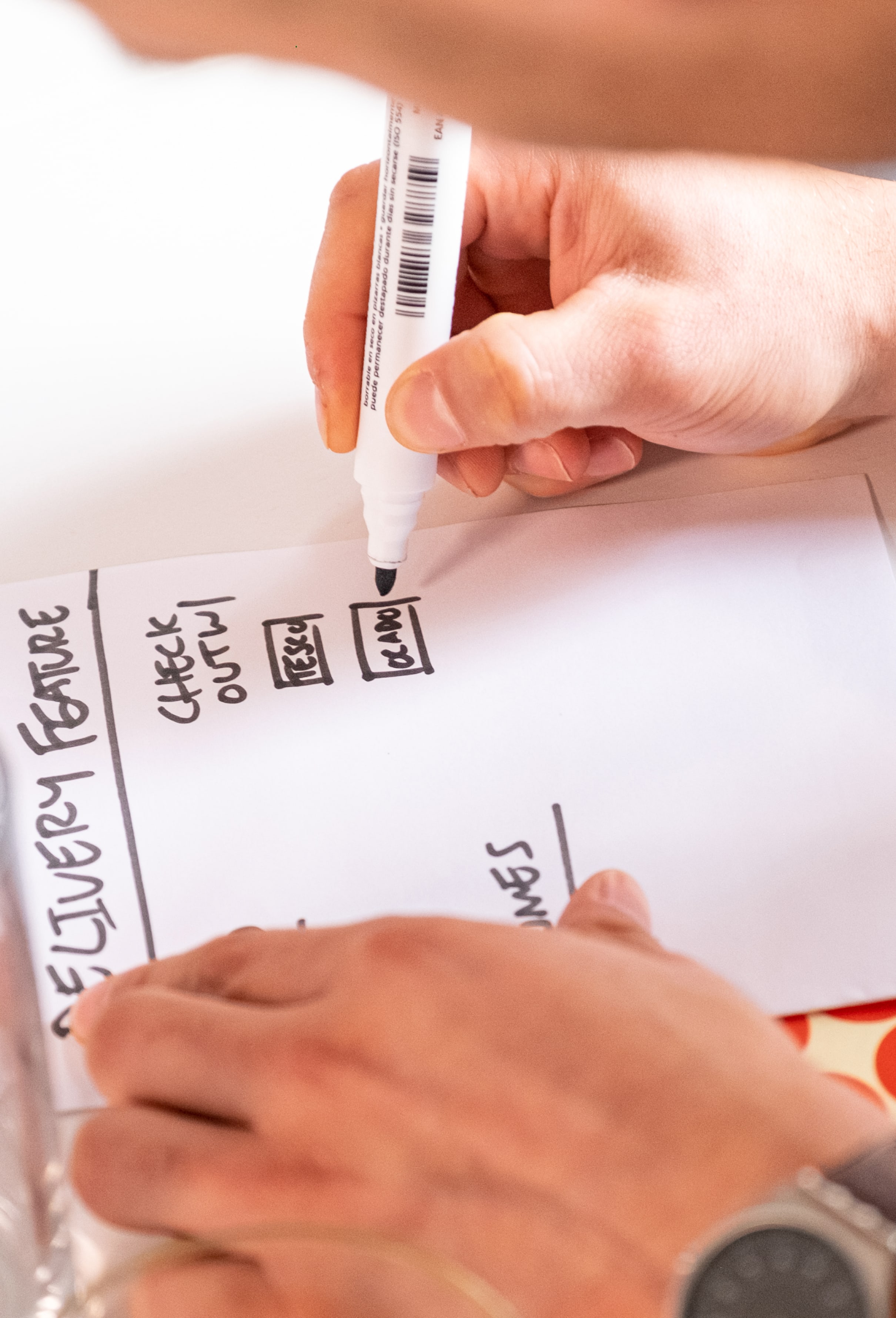 A photo of someone taking notes with a marker pen.