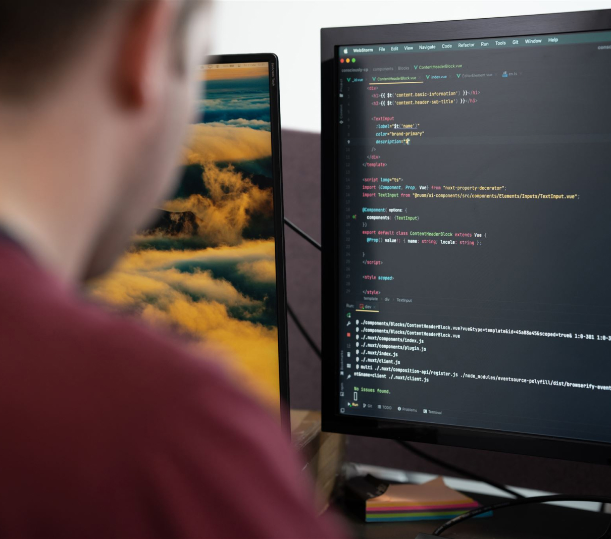 An over the shoulder shot of Loic, our head of engineering writing some code.
