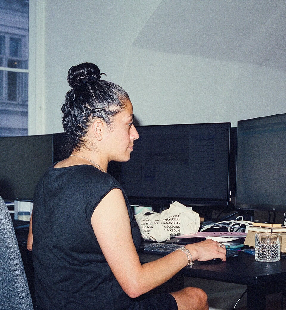 Employee working at her desk