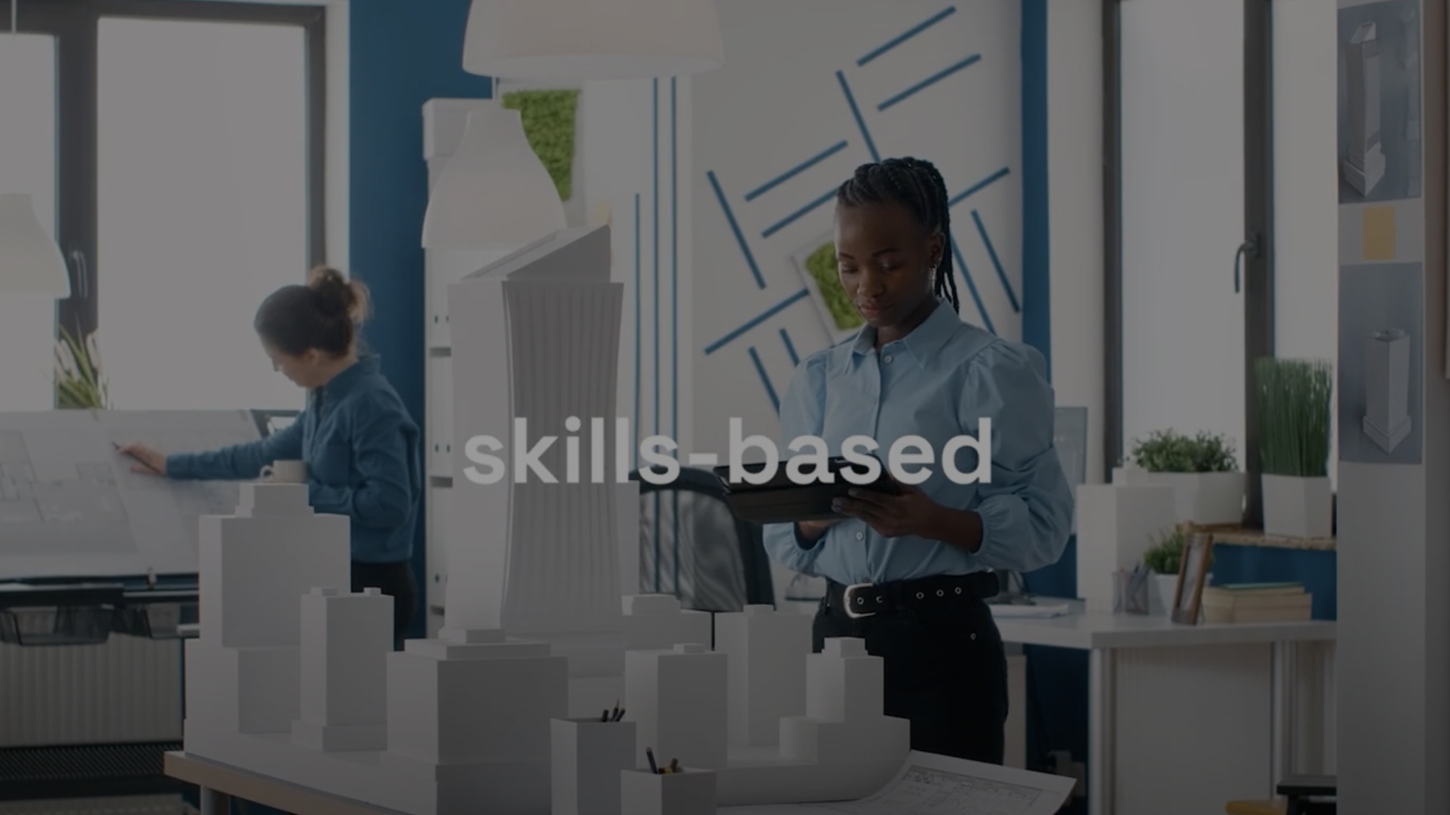 two girls in the office working - SkyHive AI