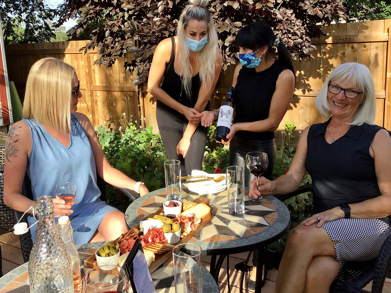 Charcuterie Board and Wine on the patio of the Sorenzo Spa