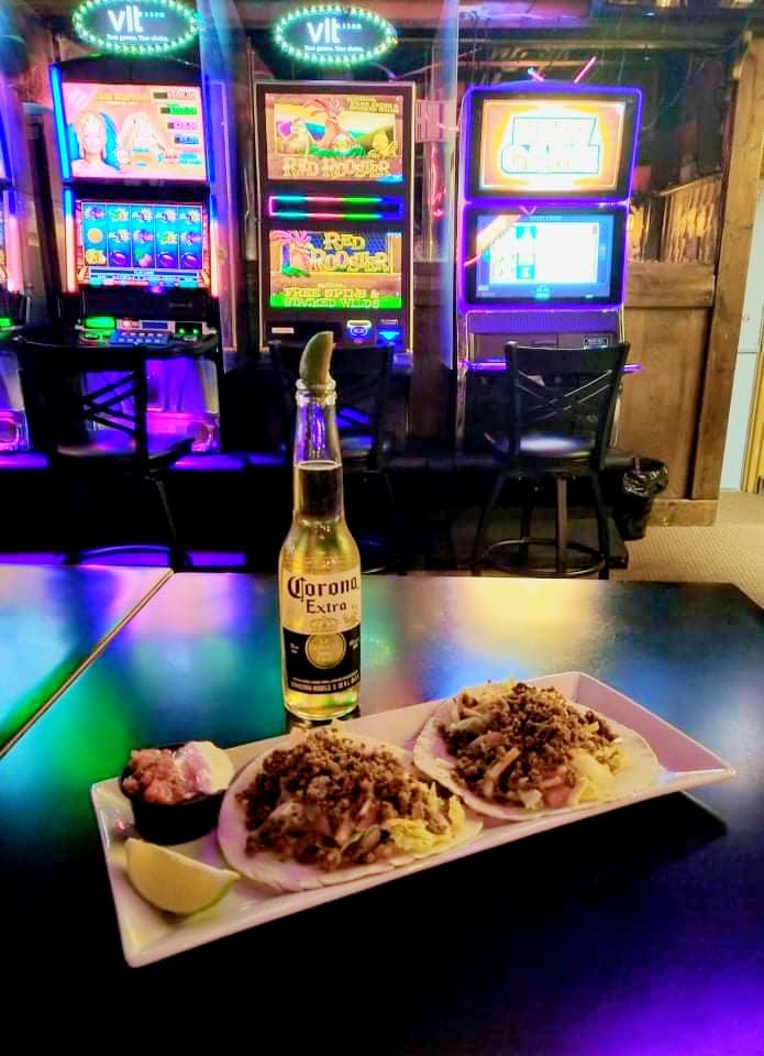 An image of beer and tacos at Chillabong's Bar and Grill. 