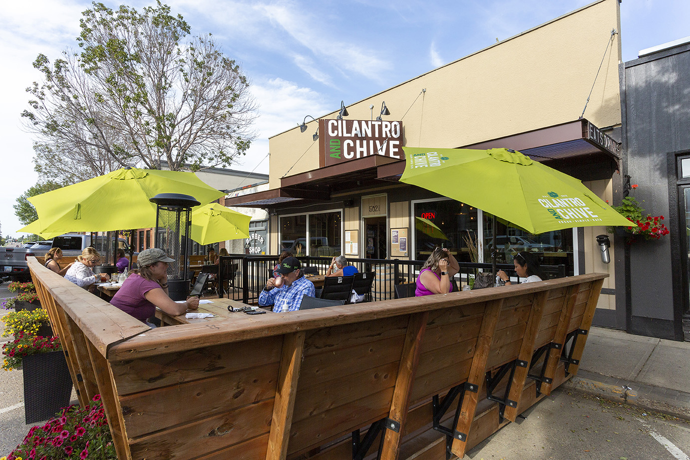 Patio with Umbrellas at Cilantro & Chive Lacombe