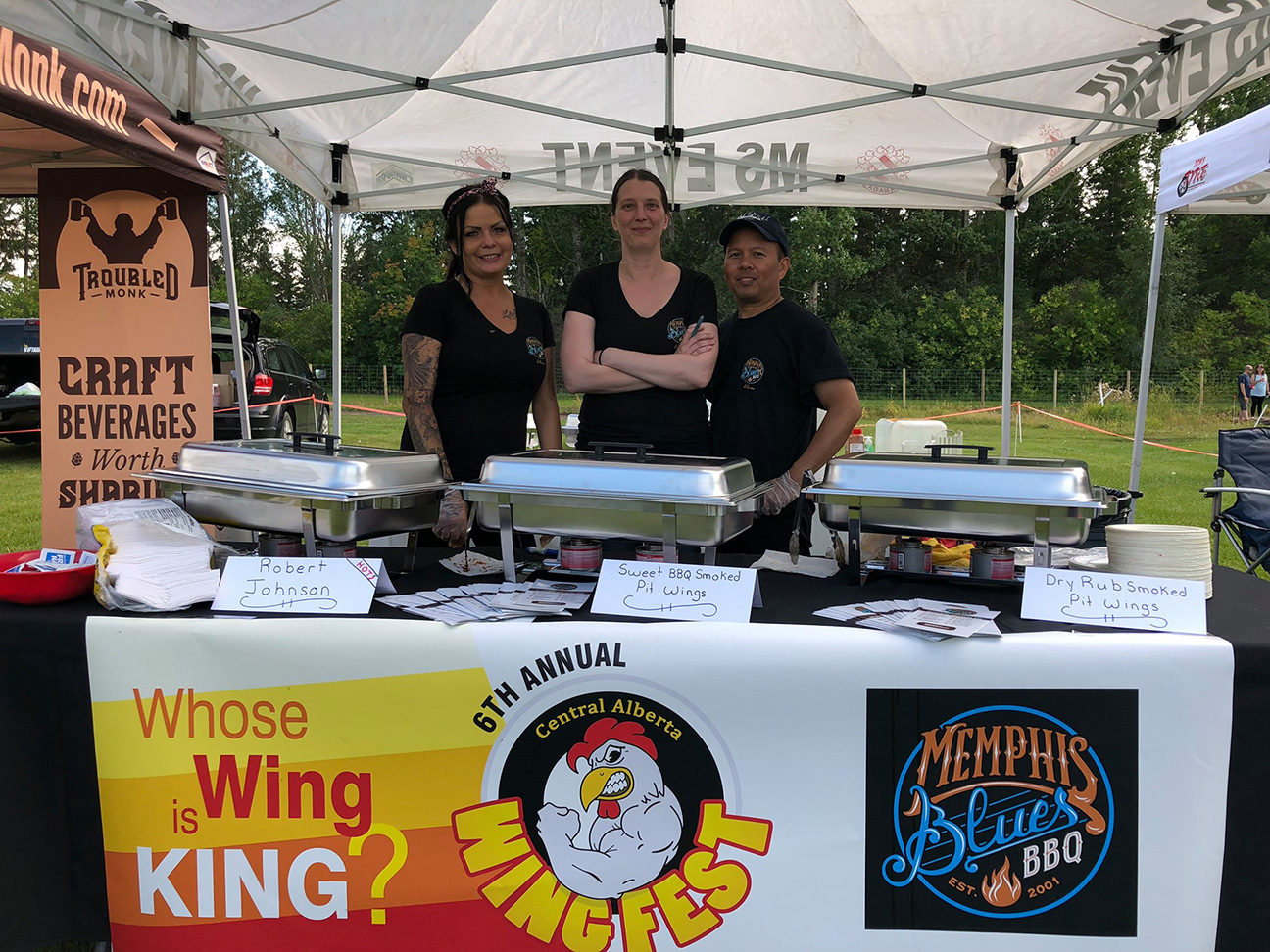 Memphis Blues BBQ team at their Wingfest booth